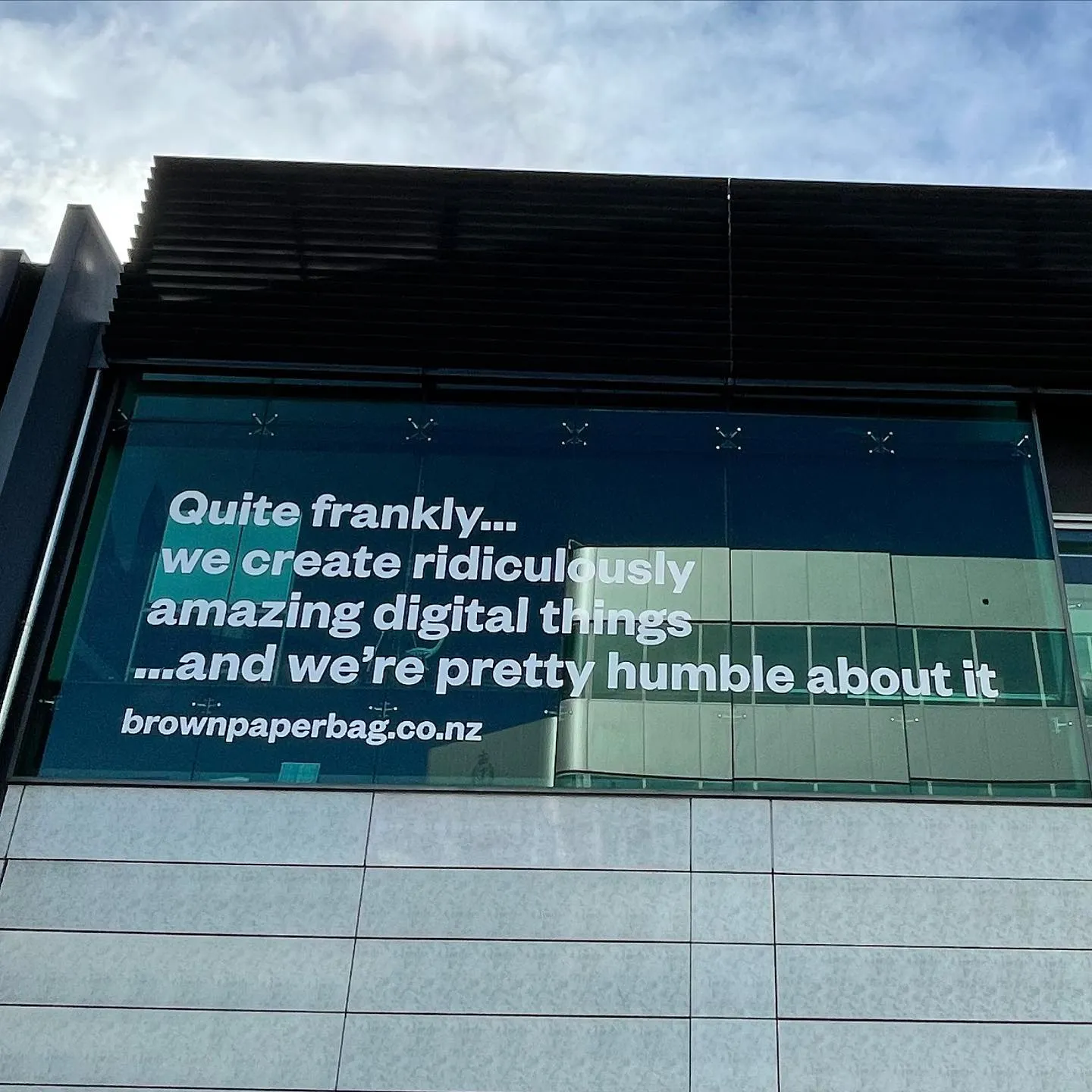 vinyl wrapping building signage